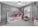 Adorable bedroom with a unique bed frame, bright decor, and ample natural light at 6034 Farmwood Se Way, Mableton, GA 30126