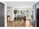 Bright breakfast nook with a view of the backyard and seating at 1384 Sunrise Way, Lawrenceville, GA 30046