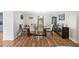 Elegant dining room with modern furnishings and hardwood floors at 1384 Sunrise Way, Lawrenceville, GA 30046