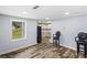 Inviting living area with wood floors that connects the room with a view outside at 1384 Sunrise Way, Lawrenceville, GA 30046