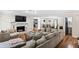 Comfortable living room with a fireplace, neutral colors, and an open layout at 1384 Sunrise Way, Lawrenceville, GA 30046
