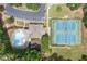 An overhead shot of the community amenities which include a pool and tennis courts at 3230 Sundew Nw Dr, Acworth, GA 30101