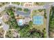 An aerial view showcasing the community pool and tennis courts at 3230 Sundew Nw Dr, Acworth, GA 30101