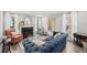 Elegant living room with hardwood floors, fireplace, and bright natural light from large windows at 267 Somerlane Pl, Avondale Estates, GA 30002