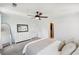 Cozy main bedroom with neutral tones, dresser with mirror, and walk-in closet entrance at 267 Somerlane Pl, Avondale Estates, GA 30002