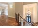 Grand foyer with hardwood flooring, chandelier and an elegant front door at 1584 Water Springs Way, Dacula, GA 30019
