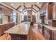 Spacious kitchen with granite counters, stainless steel appliances, and hardwood floors at 1584 Water Springs Way, Dacula, GA 30019