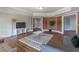 Open-concept living room with hardwood floors, and neutral walls for a serene atmosphere at 1584 Water Springs Way, Dacula, GA 30019