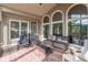 Relaxing sunroom with large windows offering views of the backyard at 1584 Water Springs Way, Dacula, GA 30019