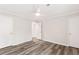 Bright bedroom with vinyl floors, fresh neutral paint, and closet space at 204 Countryside Se Pl # 204, Smyrna, GA 30080