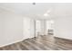 Spacious main bedroom with gray floors, a ceiling fan, a closet, and access to the bathroom at 204 Countryside Se Pl # 204, Smyrna, GA 30080