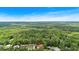 An aerial view of a home nestled in a lush, green neighborhood at 40 Polo Xing, Hiram, GA 30141