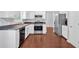 Modern kitchen featuring stainless appliances and white cabinetry at 40 Polo Xing, Hiram, GA 30141