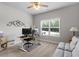 Home office featuring a ceiling fan and desk setup with computer monitors for remote work at 4690 Hopewell Manor Dr, Cumming, GA 30028