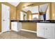 Bathroom with double vanity, large mirror, and ample counter space at 6031 Hitt Lake Ct, Stone Mountain, GA 30087