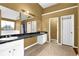 Spacious bathroom featuring a soaking tub, double vanity, and ample counter space at 6031 Hitt Lake Ct, Stone Mountain, GA 30087