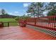 A well-maintained, expansive wooden deck at 6031 Hitt Lake Ct, Stone Mountain, GA 30087