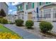Charming two-story home with a beautifully landscaped front yard and inviting walkway at 6031 Hitt Lake Ct, Stone Mountain, GA 30087