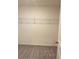 This bedroom closet features plush carpet flooring and a wire shelf at 7785 Sudbury Cir, Covington, GA 30014