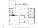 Detailed floor plan of the home's first floor showing the layout of the rooms, kitchen, and garage at 10000 Groomsbridge Rd, Johns Creek, GA 30022