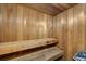 Inviting home sauna featuring natural wood construction and comfortable bench seating at 10000 Groomsbridge Rd, Johns Creek, GA 30022