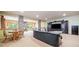 Finished basement area featuring a large TV, comfortable seating, and ample dining space at 120 Laurel Rdg, Canton, GA 30114