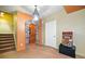 Finished basement featuring a stone archway, chandelier and decorative wall finishes at 120 Laurel Rdg, Canton, GA 30114