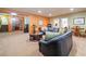 Basement area featuring a comfortable seating area, wine storage, and access to stairs at 120 Laurel Rdg, Canton, GA 30114