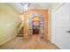 Finished basement featuring a stone archway, chandelier and neutral carpeting at 120 Laurel Rdg, Canton, GA 30114