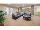 Finished basement featuring a spacious layout, stone-clad pillars, and ample seating area at 120 Laurel Rdg, Canton, GA 30114
