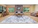 Finished basement featuring a cozy seating area, natural light, and a stylish area rug at 120 Laurel Rdg, Canton, GA 30114