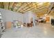 Unfinished basement with exposed ceiling, concrete walls, and ample storage space at 120 Laurel Rdg, Canton, GA 30114