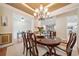 Dining room with hardwood floors, chandelier lighting, and a spacious layout at 120 Laurel Rdg, Canton, GA 30114