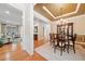 Dining room with hardwood floors, elegant chandelier, and wainscoting at 120 Laurel Rdg, Canton, GA 30114