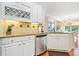 Tastefully designed kitchen with custom cabinets, granite counters, and a modern layout at 120 Laurel Rdg, Canton, GA 30114
