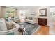 Comfortable living room with hardwood floors, stylish furniture, and natural light at 120 Laurel Rdg, Canton, GA 30114