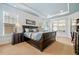 Spacious main bedroom with carpeted floors and ample natural light from the many windows at 120 Laurel Rdg, Canton, GA 30114