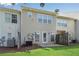 Back of the house showing a patio and fenced-in yard at 621 Kenridge Way # 0, Suwanee, GA 30024