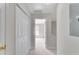 Upstairs hallway featuring neutral walls and carpet, with an open door to the bedroom at 621 Kenridge Way # 0, Suwanee, GA 30024