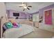 bedroom features a playful ambiance with cute decor and a ceiling fan at 6217 Millstone Trl, Douglasville, GA 30135