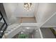 Grand foyer with high ceilings, staircase, and a view of the living space below at 6217 Millstone Trl, Douglasville, GA 30135