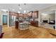 Gourmet kitchen featuring stainless steel appliances, granite countertops, and breakfast bar seating at 6217 Millstone Trl, Douglasville, GA 30135