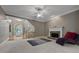 Open living room with fireplace and hardwood entry at 6217 Millstone Trl, Douglasville, GA 30135