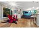Open-concept living space with hardwood floors and modern furnishings at 6217 Millstone Trl, Douglasville, GA 30135