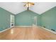 Living room features hardwood floors, vaulted ceiling, and lots of natural light at 6650 Bobby John Rd, Atlanta, GA 30349
