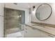 Bathroom boasting a glass shower, modern fixtures, and tile flooring at 1 Habersham Nw Way, Atlanta, GA 30305