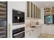 Modern kitchen featuring built-in appliances, sleek cabinetry, and designer finishes, ideal for any chef at 1 Habersham Nw Way, Atlanta, GA 30305