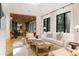 Elegant living room features hardwood floors, modern furniture, and natural light at 1 Habersham Nw Way, Atlanta, GA 30305