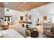 Open-concept living space with hardwood floors, modern decor, and seamless flow at 1 Habersham Nw Way, Atlanta, GA 30305