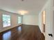 Expansive primary bedroom featuring hardwood flooring and natural light at 1892 Mercedes Ne Ct, Atlanta, GA 30345